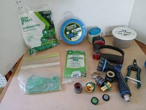 lot 3322 image: Garden Tool and Landscaping Supplies Lot with Trimmer Line Pins Hose Connectors