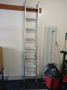 lot 3506 image: Louisville ladders Aluminum Straight Ladder 10 Step 16ft. Located in garage