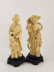 lot 115 image: Pair of Carved Chinese Figurine Statues with Black Bases