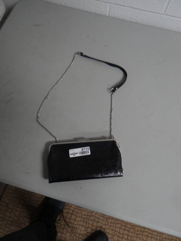 lot 8715 image: Like new Travelsmith Ladies handbag