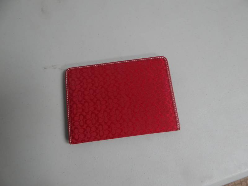 lot 8717 image: New in box Coach photo book