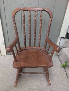 lot 2001 image: Kids Wood Rocking Chair with Spindle Back and Arms