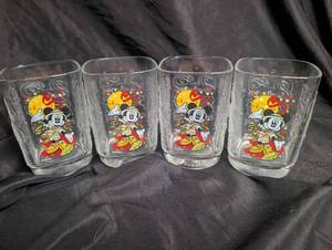 lot 2501 image: Disney Mickey Mouse Celebration 2000 Glass Mugs Set of 4