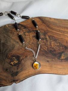 lot 3512 image: Handmade Necklace with Black Cylindrical Beads and Resin Amber Pendant