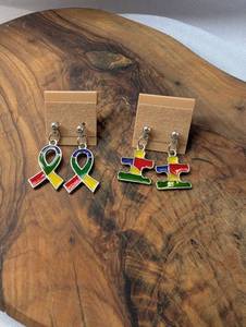 lot 3731 image: Handmade Awareness Ribbon and Puzzle Piece Enamel Dangle Earrings - 2ct