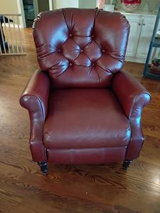 lot 900 image: Red Upholstered Recliner Chair with Rolled Arms and Tufted Backrest.  36in tall.   Seat is 20 x 20