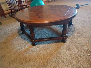 lot 923 image: Round Wooden Coffee Table.  16 x 40.  Located in basement