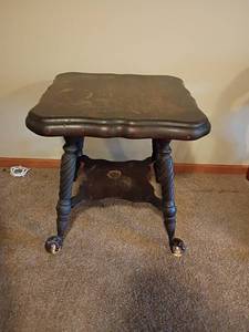 lot 938 image: Vintage Wooden Table with Claw Feet and Glass Balls on Bottom.  Needs repaired.   Located in basement.  27 x 27 x 27