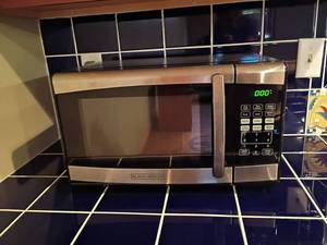 lot 944 image: Black and Decker Microwave.  12 x 19 x 14.   Located in basement