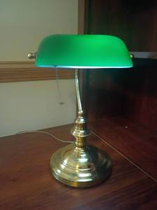 lot 954 image: 13in. Desk Lamp.  Brass bottom with green glass shade.  Located in basement