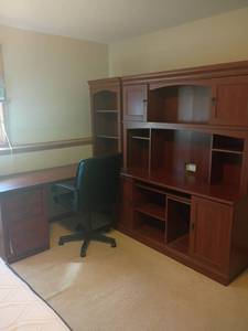 lot 955 image: Office Desk with NICE Chair.   Missing tracks for bottom drawer.  Has adjustable shelves.  Computer area.   29 x 17 x 24 and 70 x 60 x 21.  Located in basement