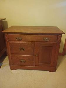 lot 967 image: Wooden Cabinet with 3 Drawers and Bottom Storage.  28 x 34 x 18.5.   Located in basement