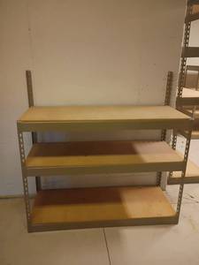 lot 969 image: Metal Shelves.  49 x 48 x 19.  Located in basement