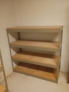 lot 972 image: Metal Shelves.   48 x 48 x 49.   Located in basement