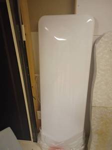 lot 976 image: Light Cover, Plastic.  Approximately 52 x 17. For fluorescent lights.  Located in basement