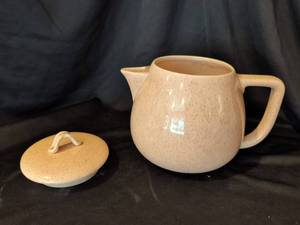 lot 1007 image: Possibly Baur of California Ceramic Teapot with Lid and Speckled Glaze. 7in