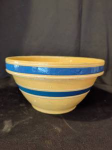 lot 1019 image: 9.5 American yellowware stonewear Mixing Bowl with Blue Stripe Band marked 7 on the bottom