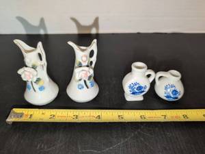 lot 1279 image: 4 Porcelain Miniature Pitchers Japan Mark Floral Decoration