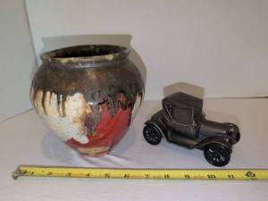 lot 1291 image: Security National Bank & Trust Company Old Car Coin Bank and Raku fired pot marked Raul