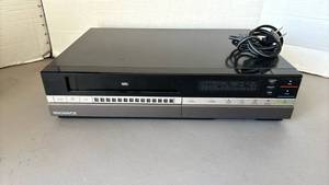lot 1308 image: Magnavox VCR VHS Video Cassette Recorder with Power Cord