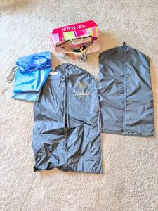 lot 1365 image: Lot of hangers, Garment Bags, and bags