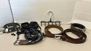 lot 1425 image: More belts and a belt hanger