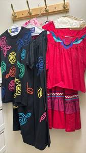 lot 1430 image: Two blouse and skirt sets (square dancing) and a small pink dance outfit