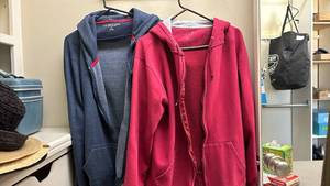 lot 1467 image: U.S. Polo Assn. Zip Hoodie Sweatshirt and a red hoodie