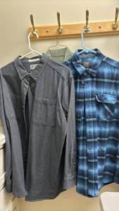 lot 1468 image: Two flannel shirts and an army shirt