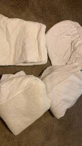 lot 1513 image: Mostly Queen mattress covers, might be one smaller