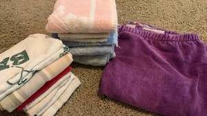 lot 1534 image: Shower wrap , hand towels and was cloths