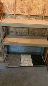 lot 3053 image: Industrial Metal Shelving Unit 2-Shelf with Cork Particle Board Tops 48x49x19 contents on shelves not included. Bottom shelf board missing