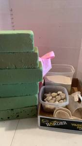 lot 3121 image: Plant lot Green Foam Blocks Polished Pebbles sand and Measuring Cups