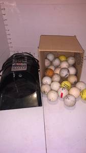 lot 3132 image: The putt master and golf balls