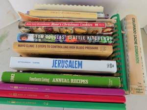 lot 3322 image: Lot of Cookbooks including The Joy of Cheesecake, Roses Christmas Cookies, Tom Douglas Seattle Kitchen