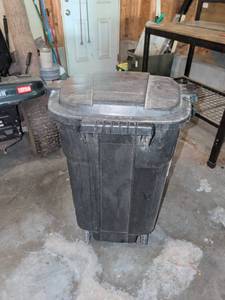 lot 3401 image: Black Plastic trash Container with Wheels and Hinged Lid