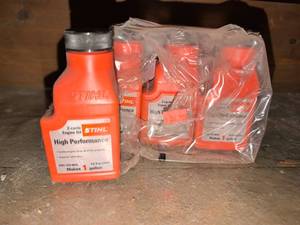 lot 3621 image: STIHL 2-Cycle Engine Oil 3 full 1 partial
