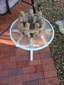 lot 4206 image: Cement friendship ring, 7X10 and glass top patio side table, 18X20