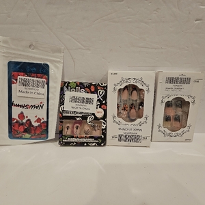 lot 625 image: Lot of 4, 3 Packs ofHalloween Press on Nails and 1 Halloween Nail Stamping Plate Nightmare Before Christmas Nails Stamping Kit The Day of Dead Ghost Holiday Nail Stamping Plate Nail Stamper
