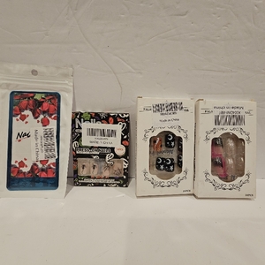 lot 626 image: Lot of 4, 3 Packs ofHalloween Press on Nails and 1 Halloween Nail Stamping Plate Nightmare Before Christmas Nails Stamping Kit The Day of Dead Ghost Holiday Nail Stamping Plate Nail Stamper