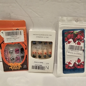 lot 630 image: A lot of three, 2 Press on Nails and 1 Halloween Nail Stamping Plate Nightmare Before Christmas Nails Stamping Kit The Day of Dead Ghost Holiday Nail Stamping Plate Nail Stamper Kit