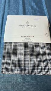 lot 2026 image: Hearth & Hand with Magnolia Oblong Tablecloth 60x84. Hearth & Home Table Runner 14x72