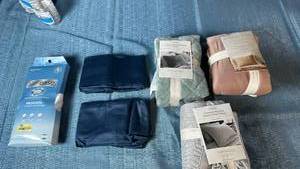 lot 2050 image: Assortment of Standard Pillow Cases and Pillow Shams.