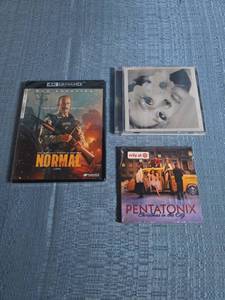 lot 8040 image: Media Lot Normal 4K Ultra HD Blu-ray, Pentatonix Christmas CD, and Ariana Grande Petal CD