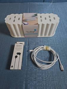 lot 8059 image: Sony MDR-EX15LP Comfortable Fit Stereo Headphones with Cord Storage Organizer and 10ft USB-C to Lightning Cord