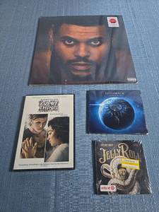 lot 8086 image: Lot of 4 Music Media The Weeknd, Everything Every Thing, Godsmack, Jelly Roll