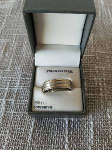 lot 4034 image: Stainless Steel Ring Size 11 Comfort Fit with Gold Accents