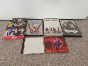 lot 4111 image: Music DVDs & CDs Lot 6 Items Beatles Heavy Metal Wilco Wings Stone Temple Pilots