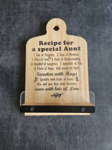 lot 4122 image: Recipe For A Special Aunt Engraved Wood Cutting Board with Metal Handle