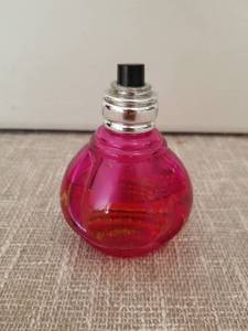 lot 4211 image: Fragrance Bottle Pink Teardrop Shape with Chrome Collar Half Full Fragrance Unknown